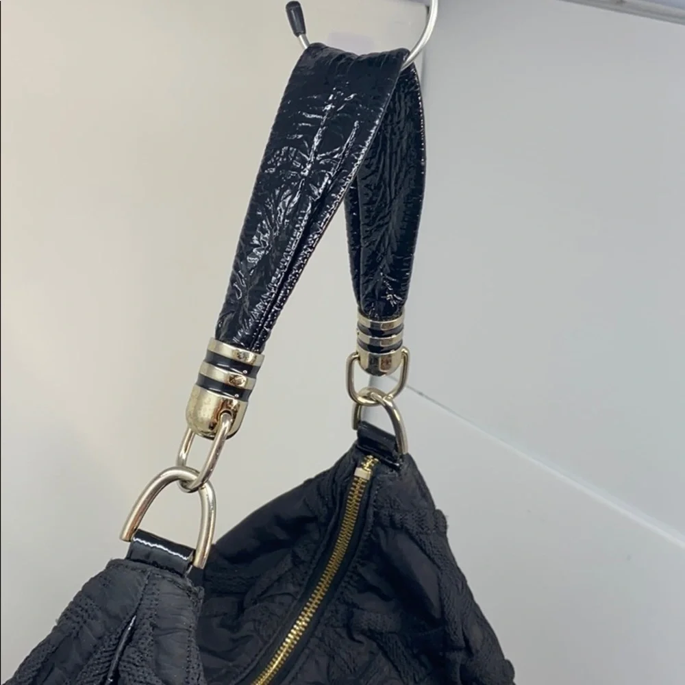 Stuart WeitzmanBlack Quilted Fabric Hobo Bag